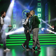 OG and Ad Finem shaking hands at the end of the tournament, via PGL Esports.